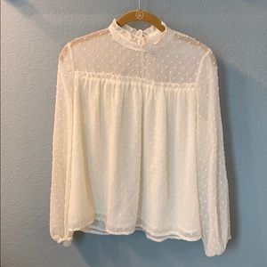 Ivory ruffle neck blouse